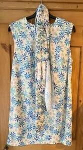 Création Robe fleurs d'enfant avec ceinture 1970