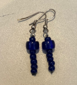 Boucle d’oreille création bleue